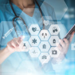Young,Woman,Nurse,Or,Doctor,Is,Using,Innovative,Technologies,In