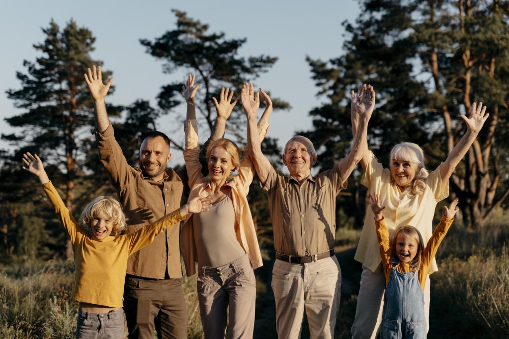 medium-shot-family-with-hands-up